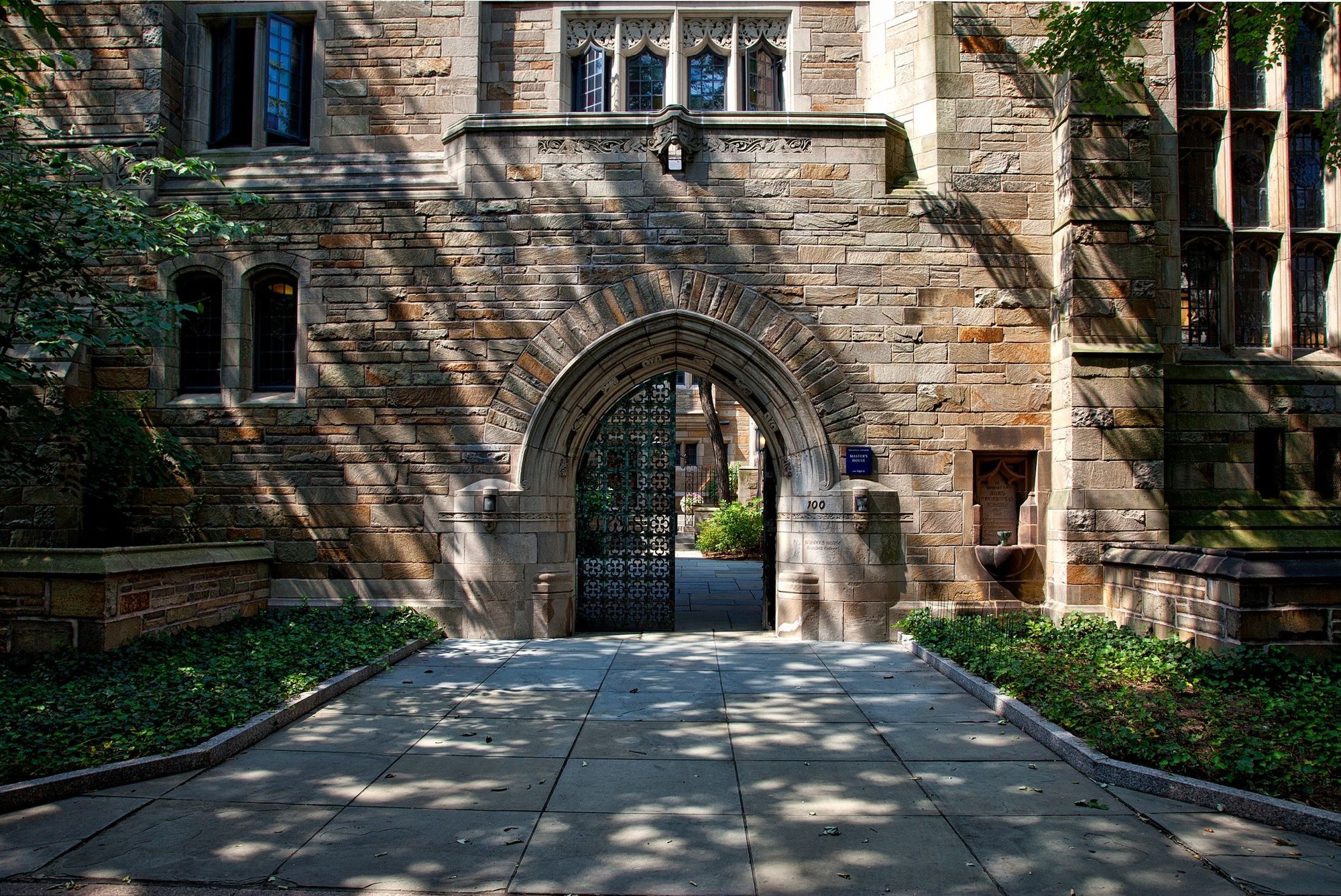 A walk through archway in a brick building